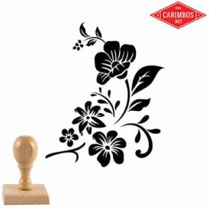 Carimbo de madeira com padrão floral decorativo em preto
